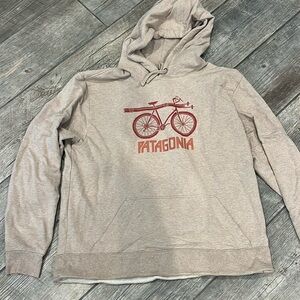Patagonia Beige Hoodie with Red Bicycle Design